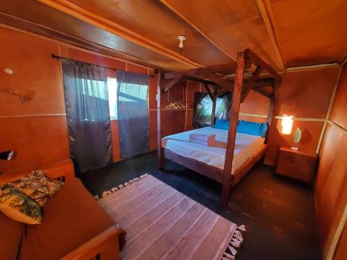 an overhead view of a bedroom with a bunk bed at Open Gate Hostel Hawaii in Pahoa