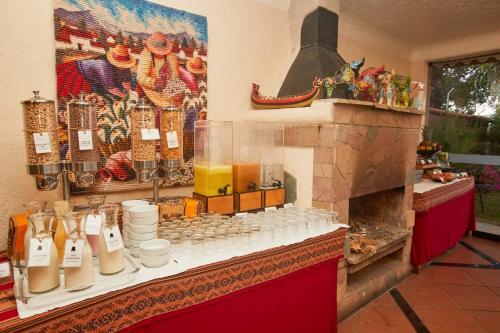 a store with a counter with a fireplace in a room at Casa Andina Premium Puno in Puno