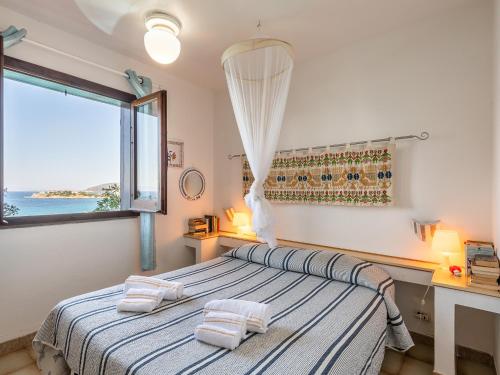 Ένα ή περισσότερα κρεβάτια σε δωμάτιο στο CASA FLAMINIO