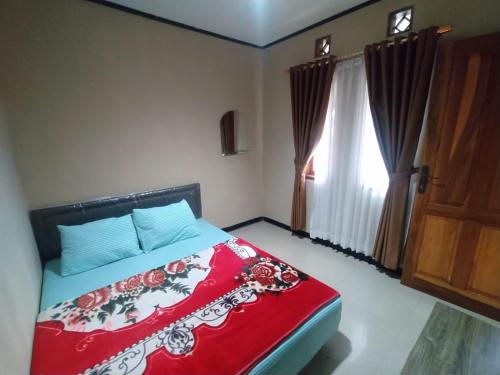 Ένα ή περισσότερα κρεβάτια σε δωμάτιο στο Villa Beverly