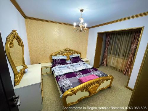 Un pat sau paturi într-o cameră la Apartament De Lux zona 0 Botosani 2 camere