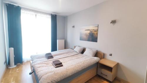 Posteľ alebo postele v izbe v ubytovaní Szlak 50 by Homeprime