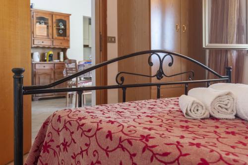 Katil atau katil-katil dalam bilik di Vacanze e Relax Frassino