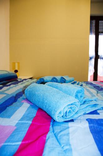 Cama o camas de una habitación en B&B Nonna Sini