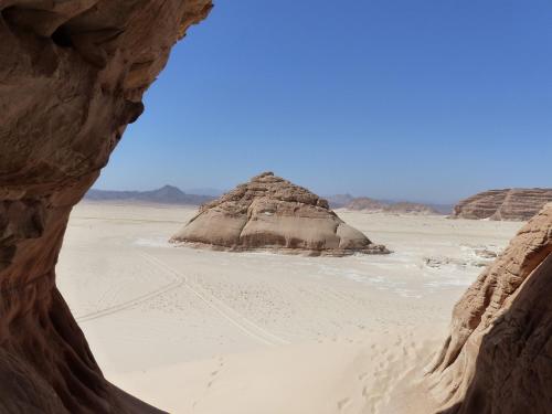 a view of a desert with a rock formation at Think Love on Red Sea in Nuweiba