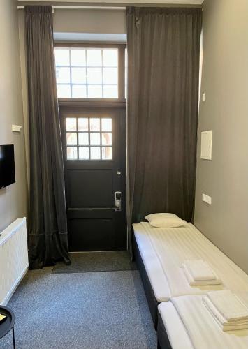 Кровать или кровати в номере Unique Hotel