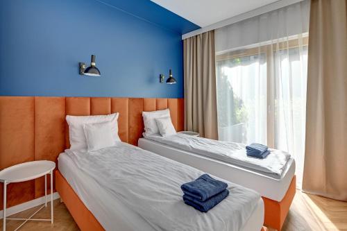 Un pat sau paturi într-o cameră la Quiet and large apartment to work and rest-4people