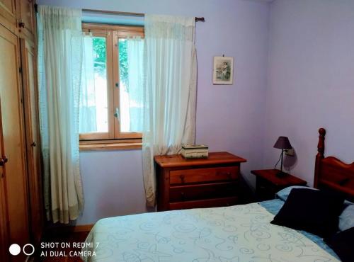 Ένα ή περισσότερα κρεβάτια σε δωμάτιο στο Apartamento en Boi