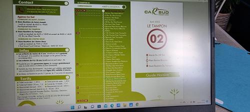 a menu for a restaurant on a laptop computer at Le Palmier de la Paix in Le Tampon