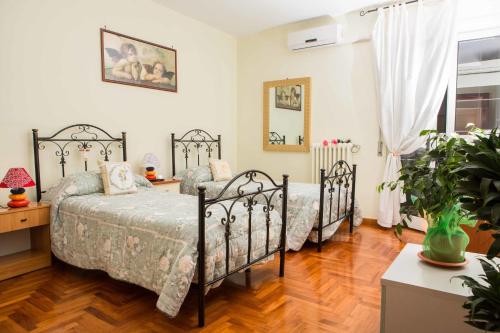 Katil atau katil-katil dalam bilik di B&B Stupor Mundi