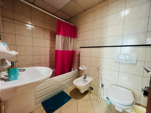 a bathroom with a sink and a toilet and a shower at SKY NEST HOMES PRIVATE 1 BEDROOM APARTMENT DUBAI MARINA in Dubai
