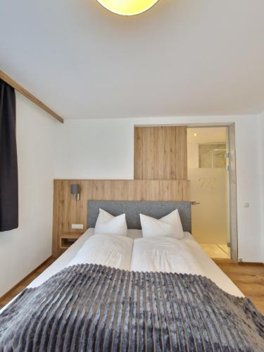 Ένα ή περισσότερα κρεβάτια σε δωμάτιο στο Alpenchalet Melanie
