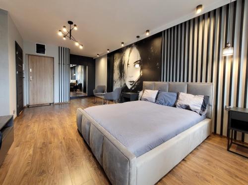 Posteľ alebo postele v izbe v ubytovaní Apartament Stare Miasto Gdańsk z widokiem na Motławę