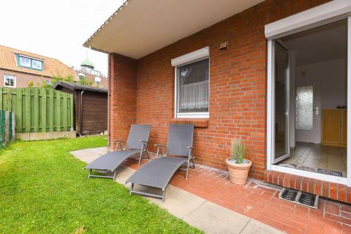 Κήπος έξω από το Ferienwohnung Norderney Inselhaus am Deich
