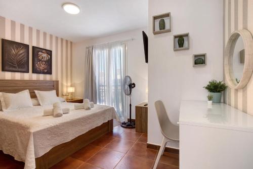 Postel nebo postele na pokoji v ubytování Villa Valeria