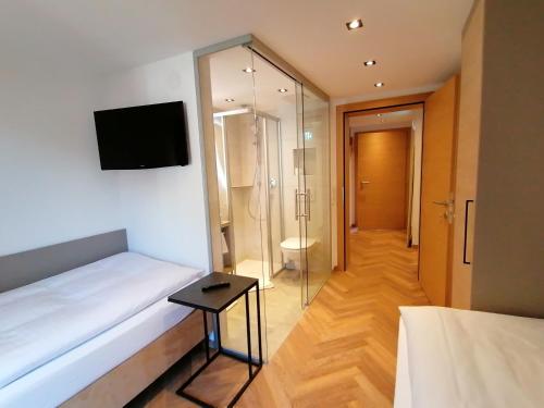 Letto o letti in una camera di Haus Marion Haueis