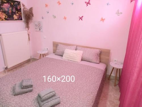 Ένα ή περισσότερα κρεβάτια σε δωμάτιο στο PUZZLE SWEET HOME