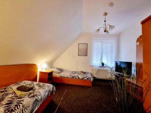 Ένα ή περισσότερα κρεβάτια σε δωμάτιο στο Hostel PRIMAX