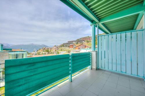 a balcony with a view of a city at Villaggio Olimpico in Sestriere