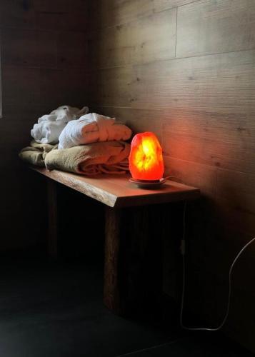 an orange pumpkin sitting on a table in a room at Baita Alpenrose in Ugovizza