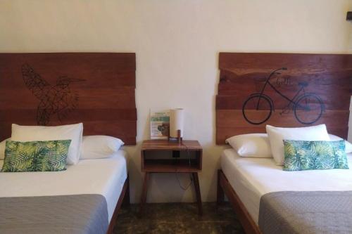 Cama o camas de una habitación en Hotel Sur Bacalar