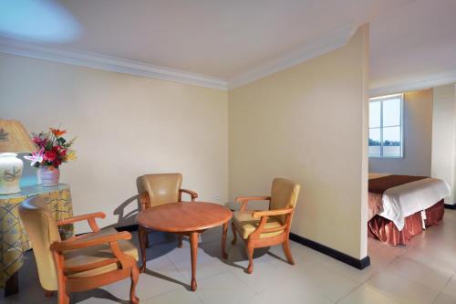 Posezení v ubytování Aston Karimun City Hotel