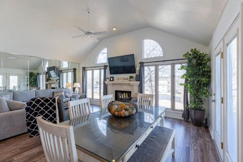 a dining room and living room with a table and chairs at B 32-1 Spacious Villa Close to Pool in Branson