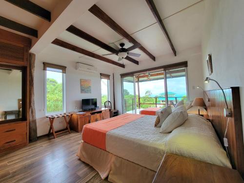 Postel nebo postele na pokoji v ubytování Semilla Verde Boutique Hotel