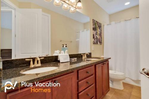 a bathroom with a sink and a toilet at 371-Luxury Villa with POOL in Orlando