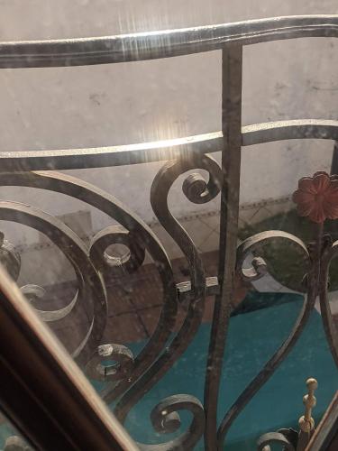 a view from the top of a wrought iron railing at Habitación Boutique in Villa Alsina