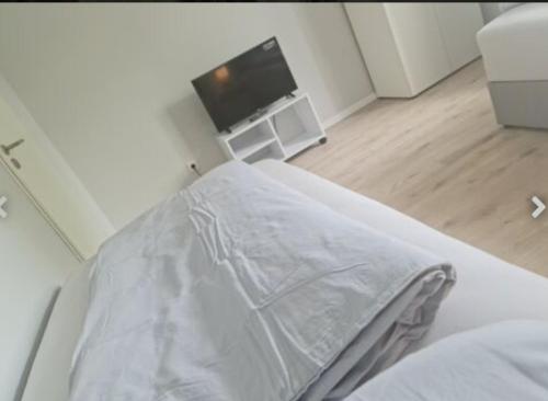 Cama o camas de una habitación en Schönes neuwertiges 3 Zimmer Apartment - zentral