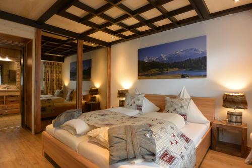Cama o camas de una habitación en Ferienwohnung Linderspitzblick