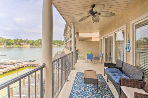a balcony of a house with a view of the water at Balcony and Boat Slip Lakefront Unit in Hot Springs in Hot Springs