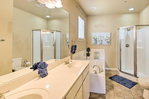 a bathroom with a sink and a shower and a toilet at Lakefront Hot Springs Condo with Balcony and Boat Slip in Hot Springs