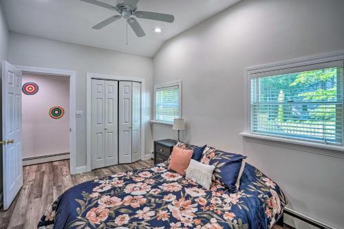 a bedroom with a bed and a ceiling fan at Pet-Friendly Saratoga Springs Home with Pool! in Saratoga Springs