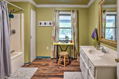 a bathroom with a sink and a table and a tub at Hike On-Site Classic Cabin Nature Retreat in Glens