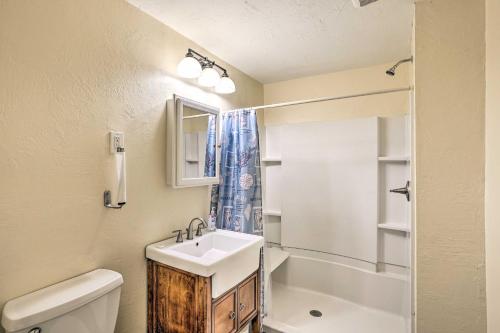a bathroom with a sink and a toilet at Sebring Condo with Game Room Less Than 13 Mi to Raceway in Sebring