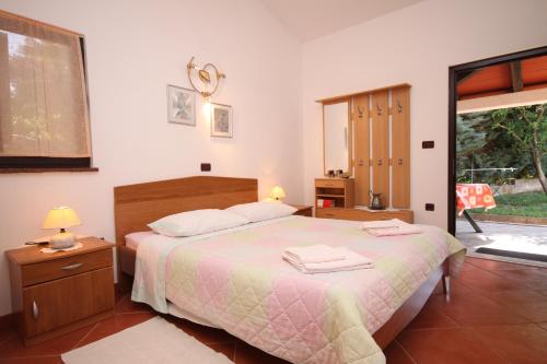 Posteľ alebo postele v izbe v ubytovaní Studio Umag 7666a