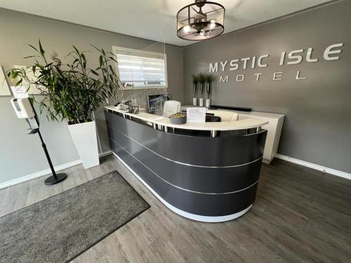 a lobby with a reception desk in a music isle motel at Mystic Isle Motel in Wawa