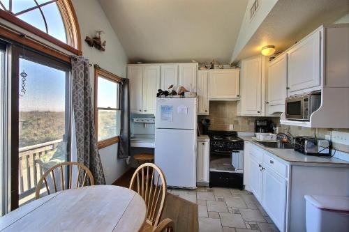 Kuchyň nebo kuchyňský kout v ubytování NC 12 56821-27 Condo