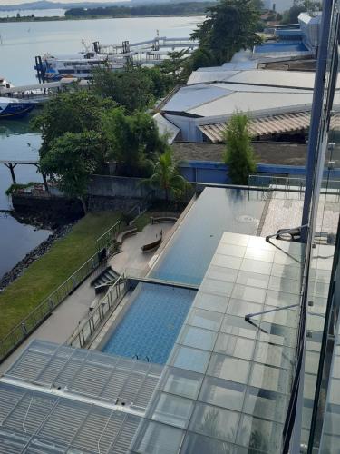 an overhead view of a swimming pool on top of a building at One Residence Batam Unit 3AB in Batam Center