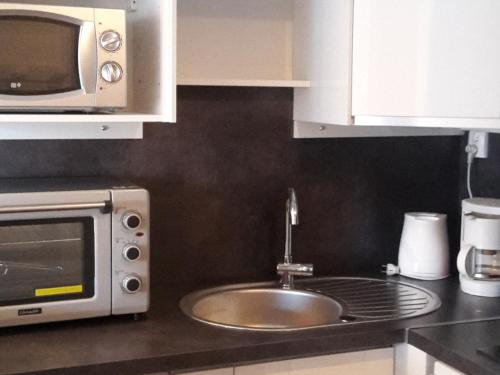 Appartement Skis aux Pieds, 4 Personnes, Balcon, Wifi Gratuit, Proche Commerces et Activités - FR-1-574-39