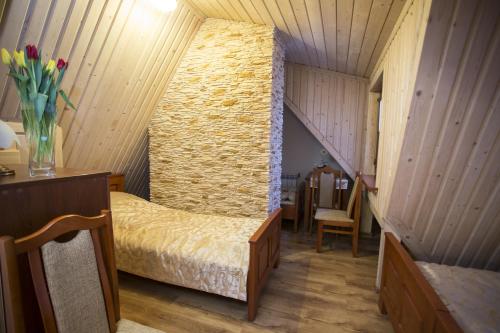 Postel nebo postele na pokoji v ubytování U Gruloka