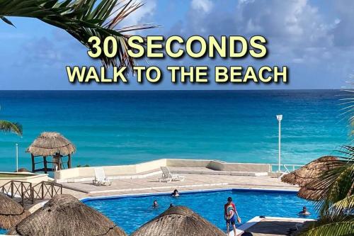 a guide to reasons to walk to the beach at Cancun Oceanfront, Entire Apartment in Cancún