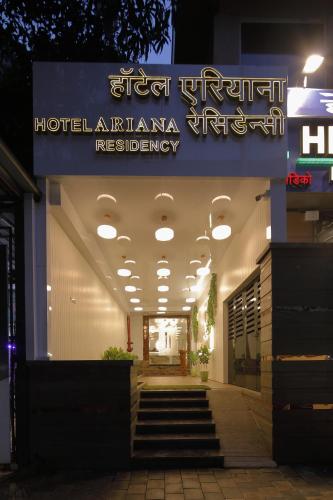 a building with a sign for a hotelianeiane residency at Hotel Ariana Residency in Mumbai