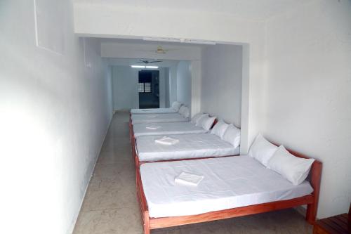 Cama o camas de una habitación en MIST RESIDENCY
