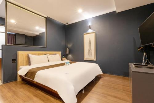 Ένα ή περισσότερα κρεβάτια σε δωμάτιο στο Sorgente Business Hotel