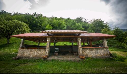 a gazebo with a roof on top of it at Camp &Apartmens Scepanovic in Mojkovac