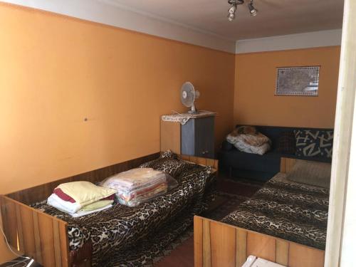 Posteľ alebo postele v izbe v ubytovaní Budai Vendégház