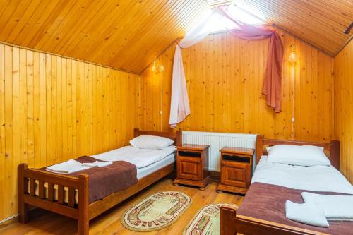 Una cama o camas en una habitación de Milana SPA & Hotel - SPA included